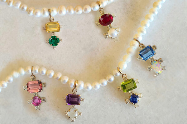 Left to Right: Citrine & Emerald; Ruby & Pearl; Tourmaline & pink Sapphire; Amethyst & Moonstone; Peridot & Sapphire; Blue Topaz & Opal. All set with Moissanites all around.