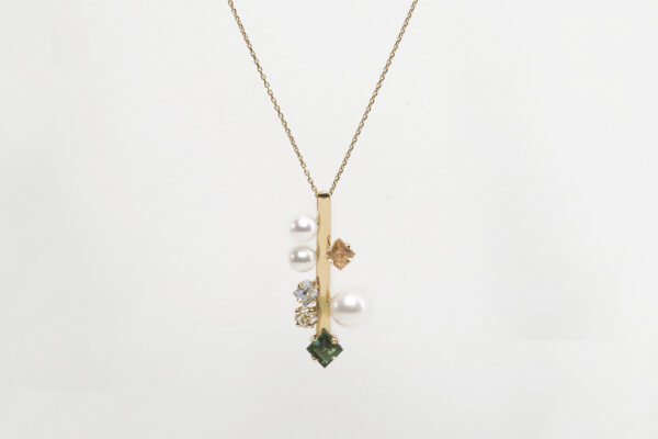 18k gold, princess shape tourmalines & freshwater pearls.