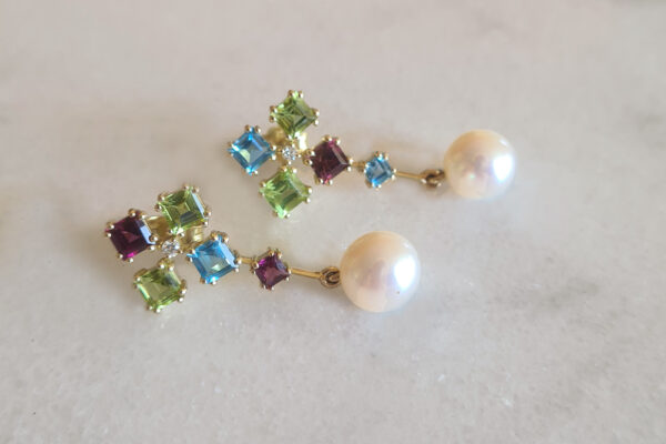 18 gold, blue topaz. peridot, garnets, moissanites & freshwater pearls.