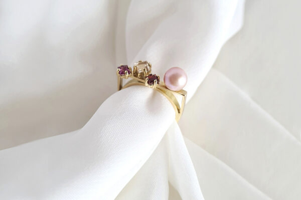18k gold ring; pink freshwater pearl, garnet & tourmalines.