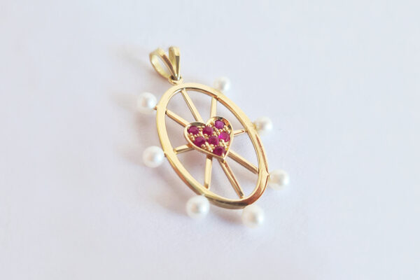 18k gold pendant; set with rubies & freshwater pearls.